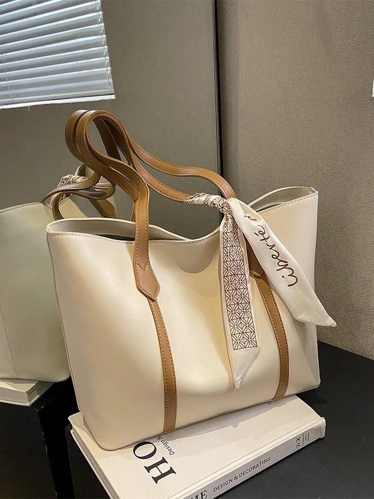 Women's large-capacity soft bucket shoulder bag in multiple colour options with zipper pocket