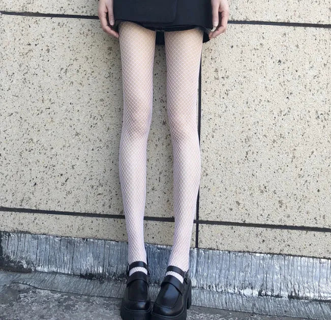 Women's summer mesh stockings showing large, medium and small net patterns in black and white.