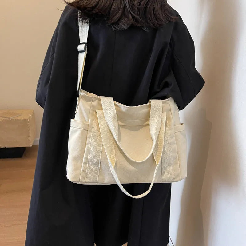 Large capacity polyester shoulder tote bag for women in solid colours with mobile phone pocket
