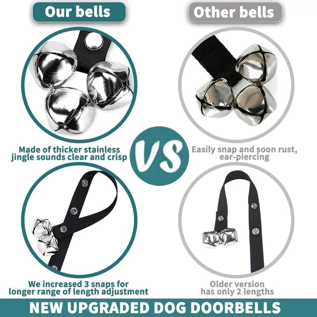 Seven silver metal dog training bells on a black adjustable nylon strap hanging from a door handle.