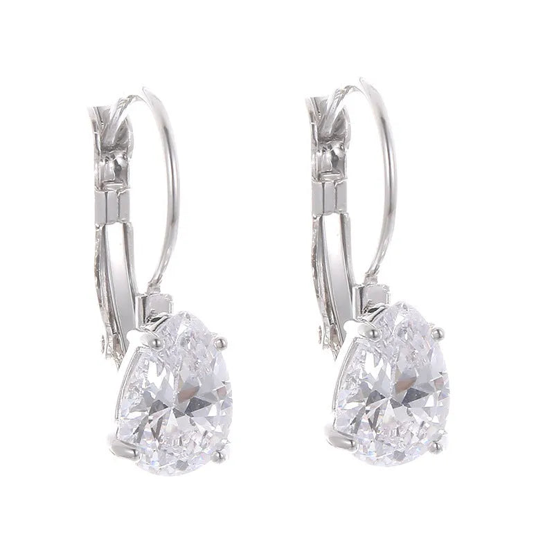 Women's drop-shaped simple metal fashion earrings in gold and platinum colour options.