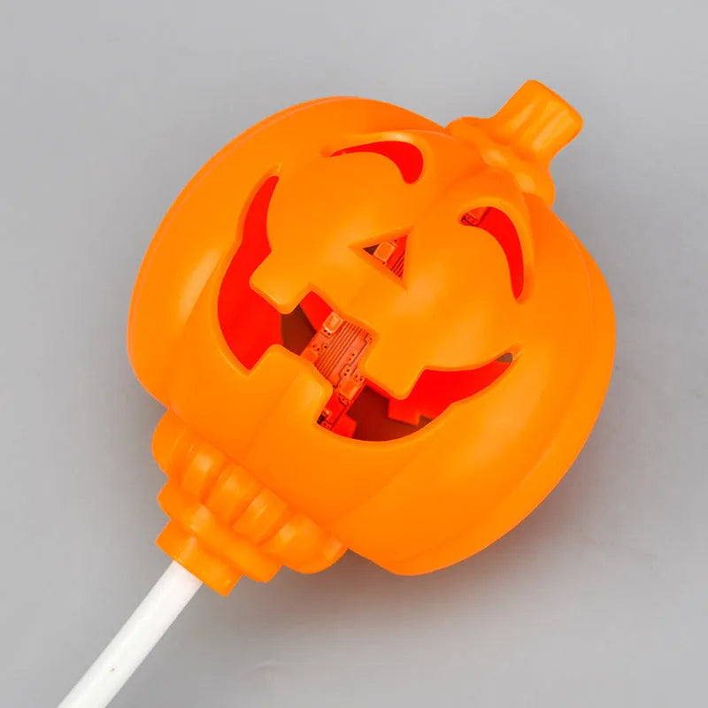 Plastic pumpkin lamp with USB charging port displaying yellow or purple light option