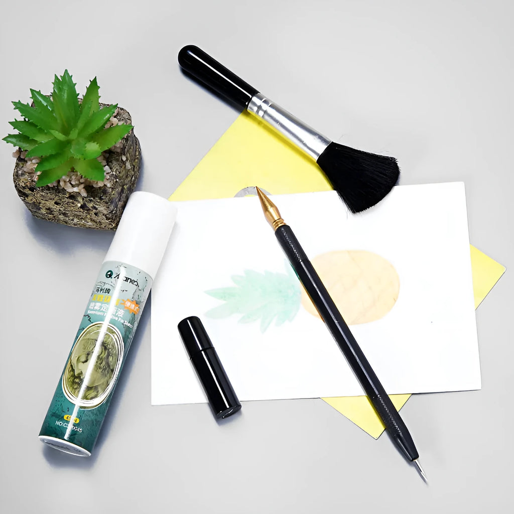 Scratch art repair tool set with scraping pen, liquid solution, brushes, and bamboo sticks on a craft table.