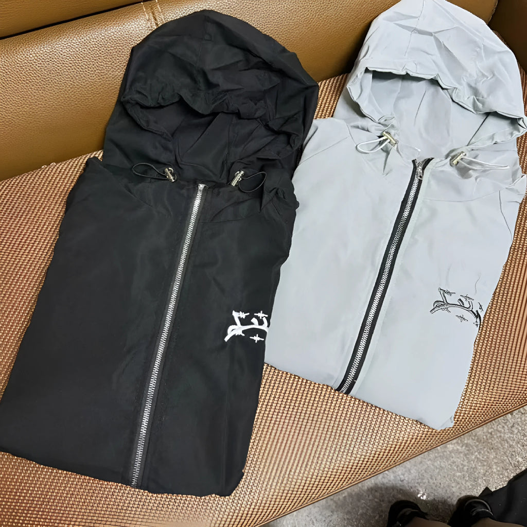 Men's grey loose fit hooded jacket with polyester construction for sun protection