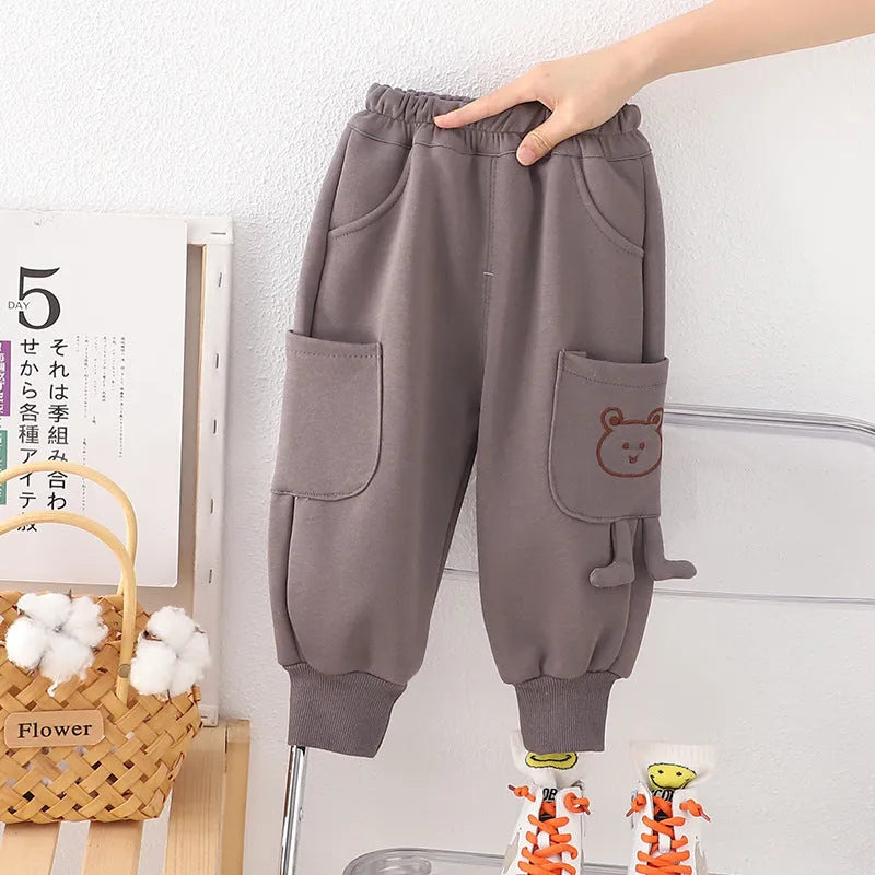 Boys' velvet sport pants in gray, green, and brown with elastic waistband and drawstring