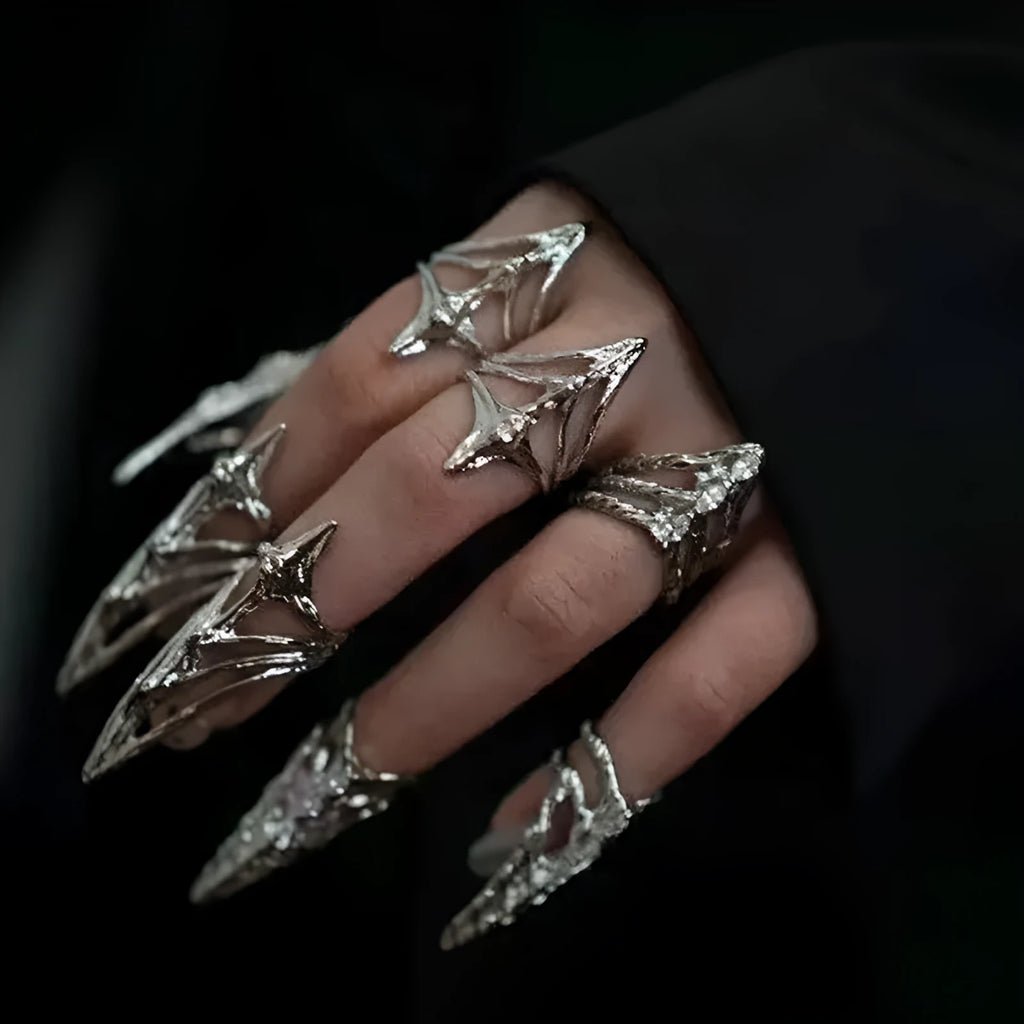 Metal ring with micro inlaid zircon and butterfly geometric design, INS style, on a white background