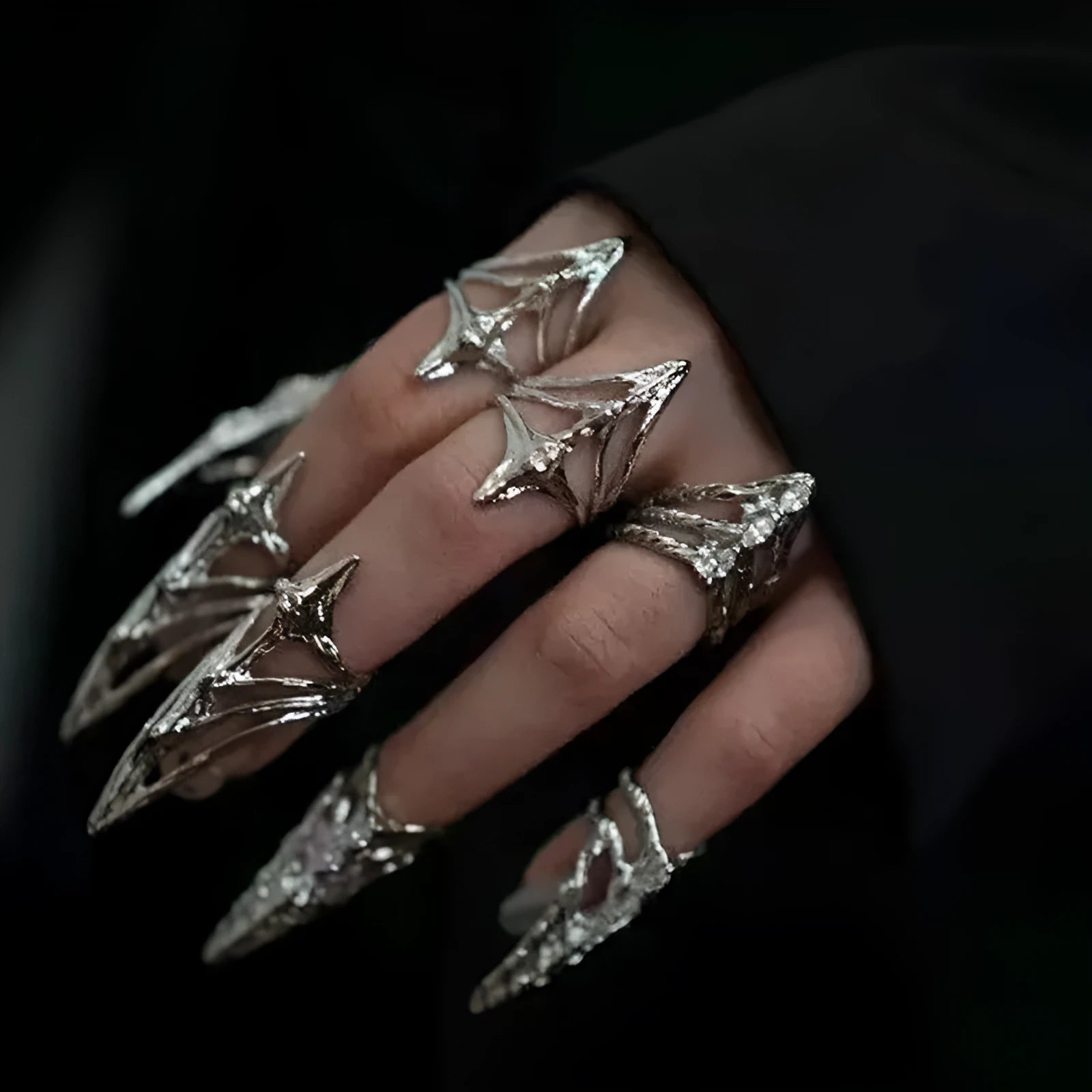 Metal ring with micro inlaid zircon and butterfly geometric design, INS style, on a white background