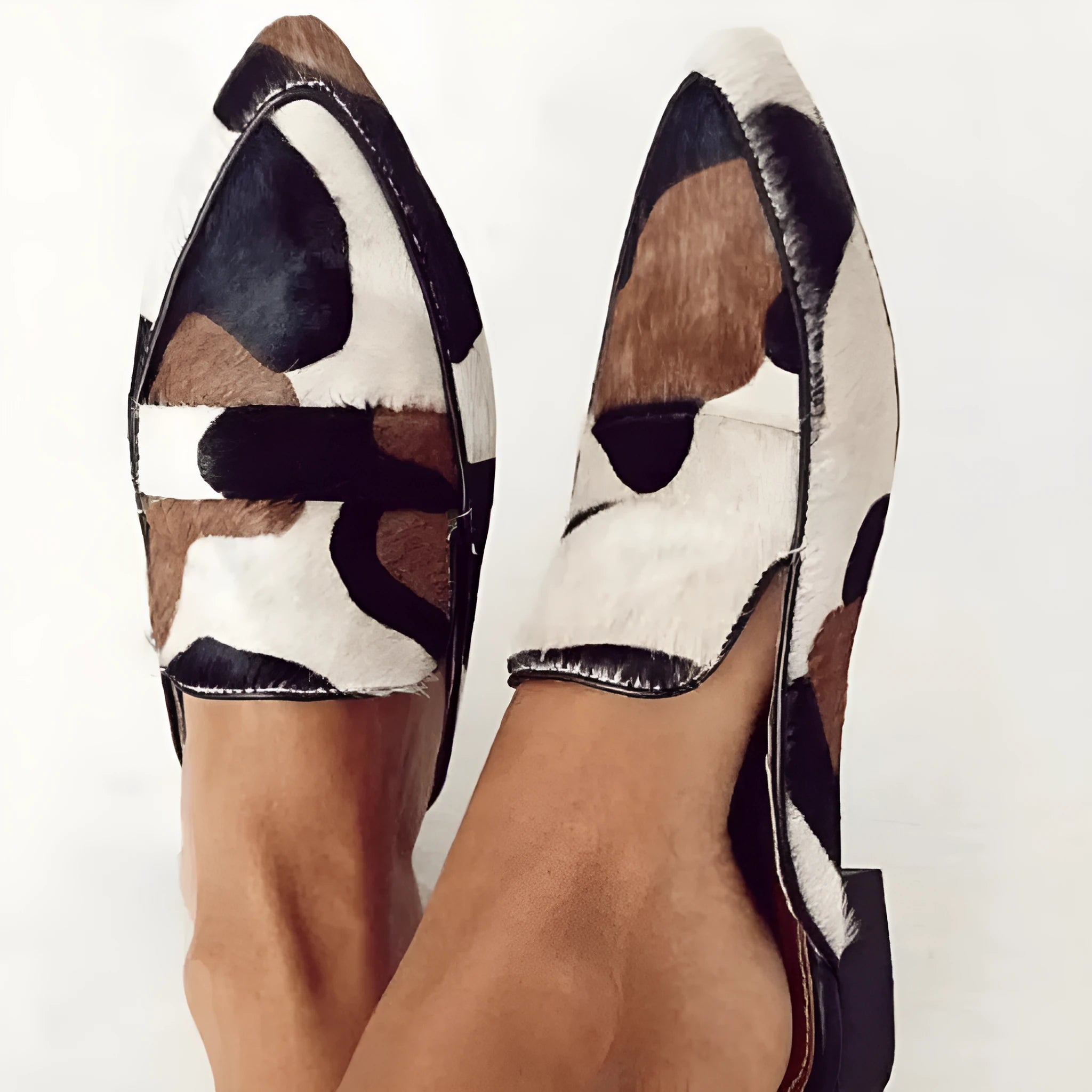 Women's black and white apricot retro pointed-toe low heel shoes with suede imitation horse hair pattern.