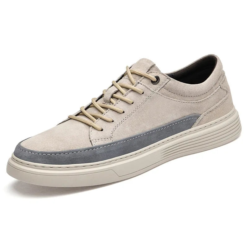 Men's grey casual skate shoes with pigskin leather upper and rubber sole, front lace-up closure