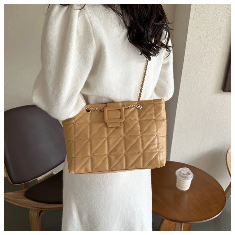 Women shoulder bag in trapezoid shape with chain strap, PU material, three-dimensional pocket, available in black white khaki brown