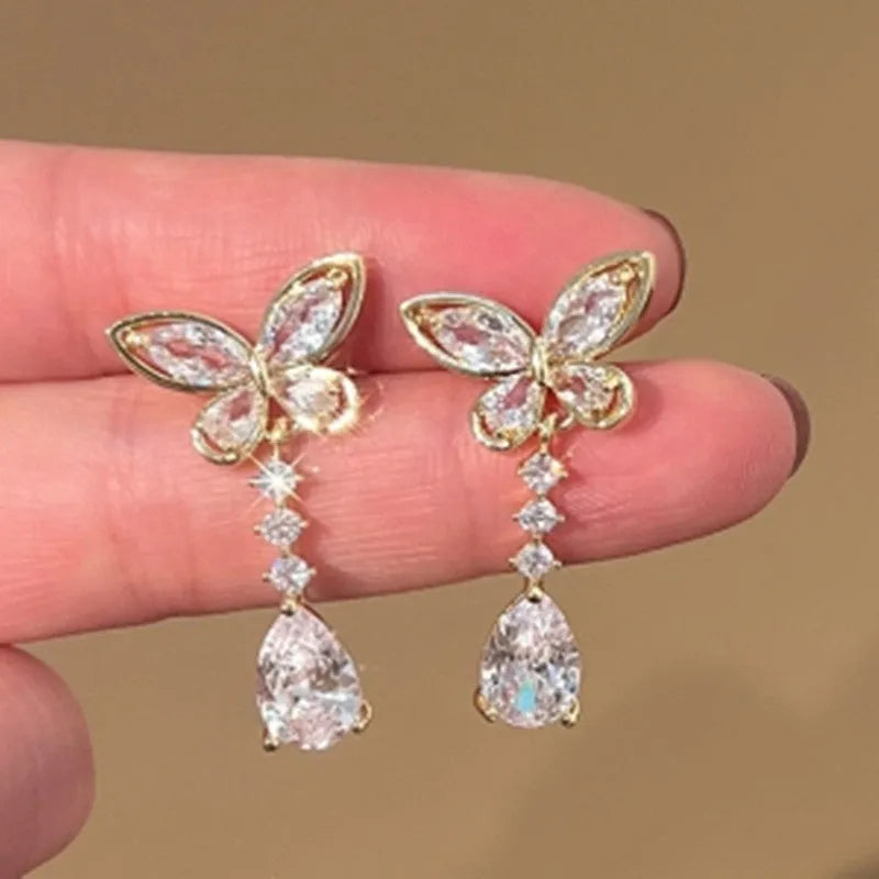 Bow stud earrings with electroplated platinum finish on zinc alloy