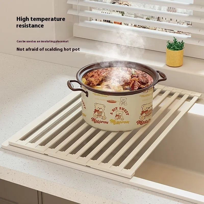 Milky White foldable stainless steel kitchen draining rack shown folded and unfolded.