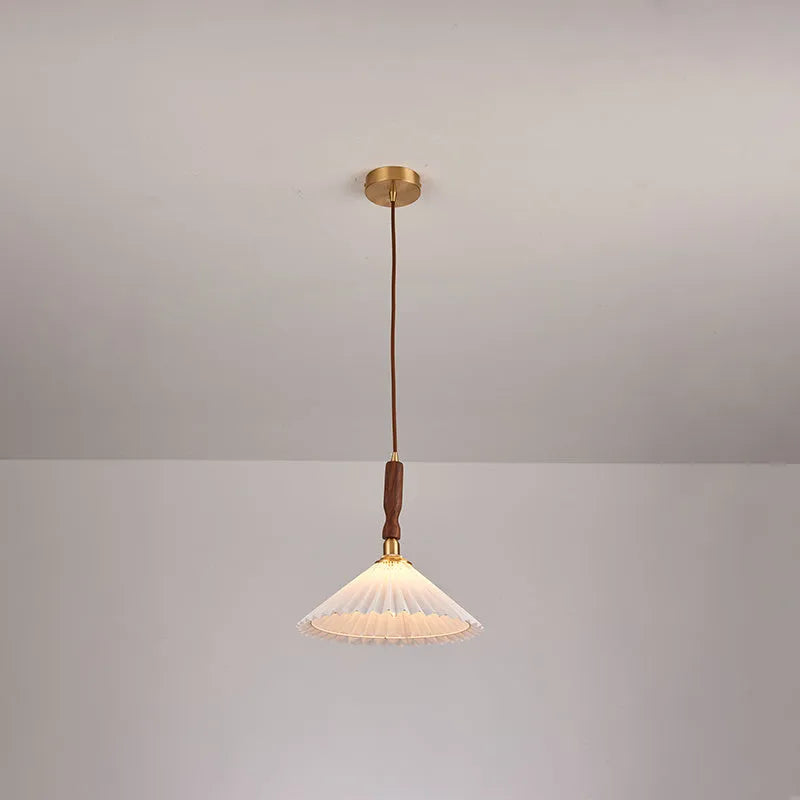 American retro-style walnut wood wall lamp with fabric shade and copper accents.