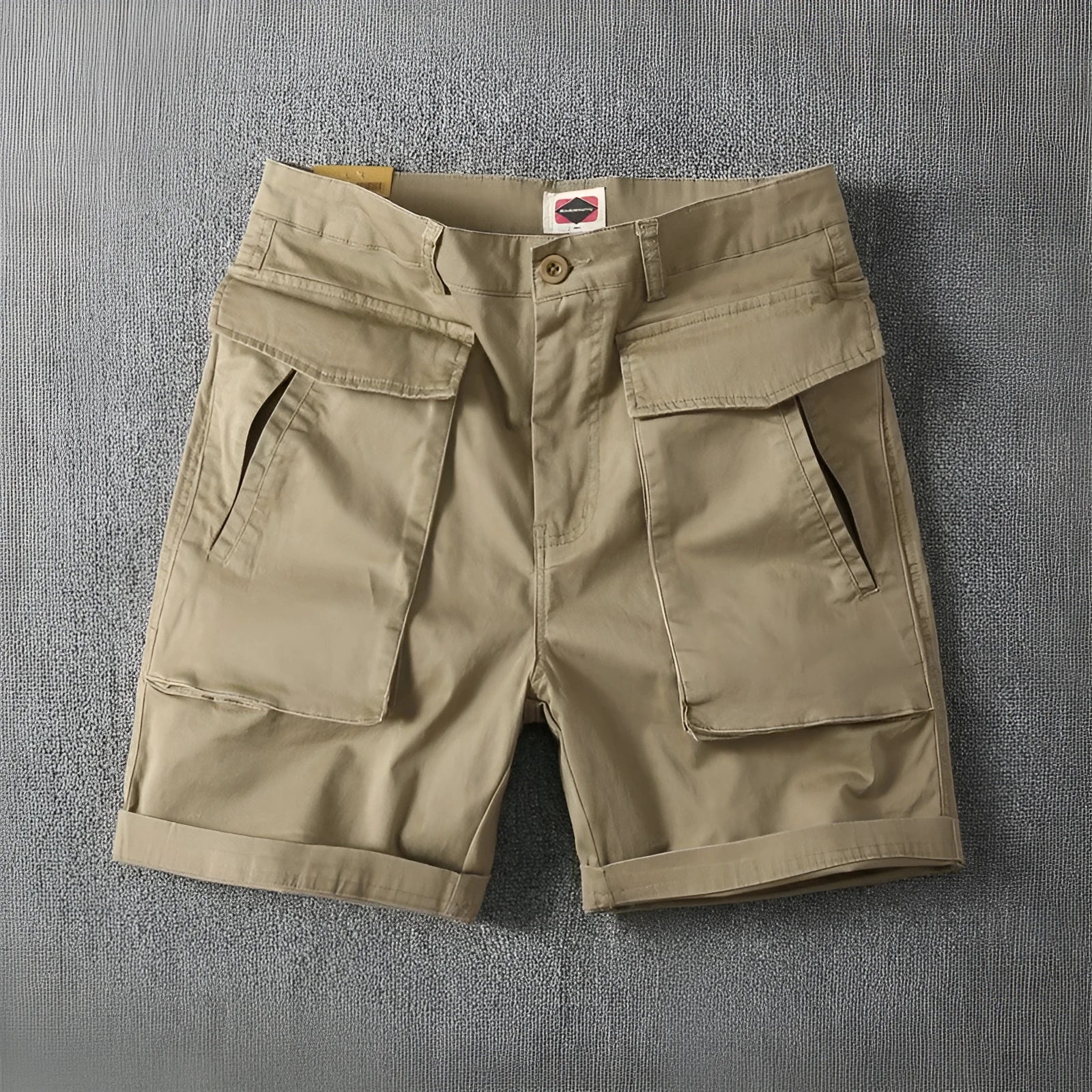 Men's army green cotton cargo shorts with multiple pockets and a straight leg design.