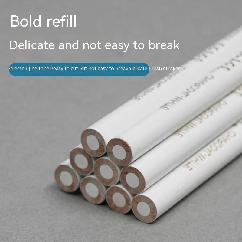 Set of three white charcoal pencils in wooden barrels for artistic highlighting
