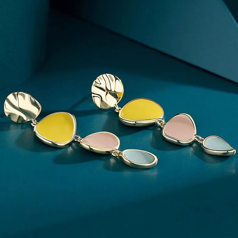 Morandi three-colour oil-drip finish on simple alloy disc vintage earrings with sterling silver post.