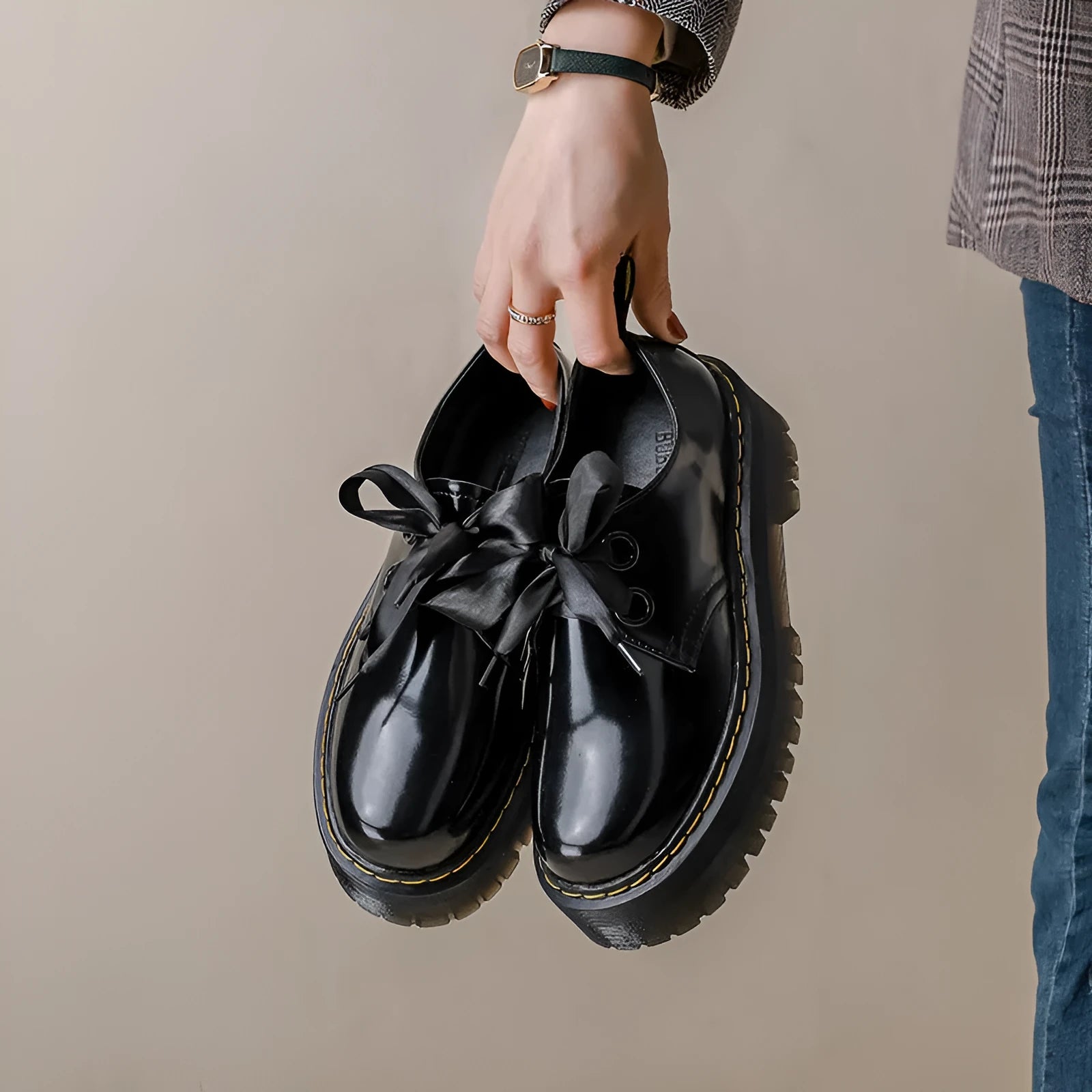 Women's thick-soled leather shoes in black with ribbon and cross strap details on superfine fibre upper