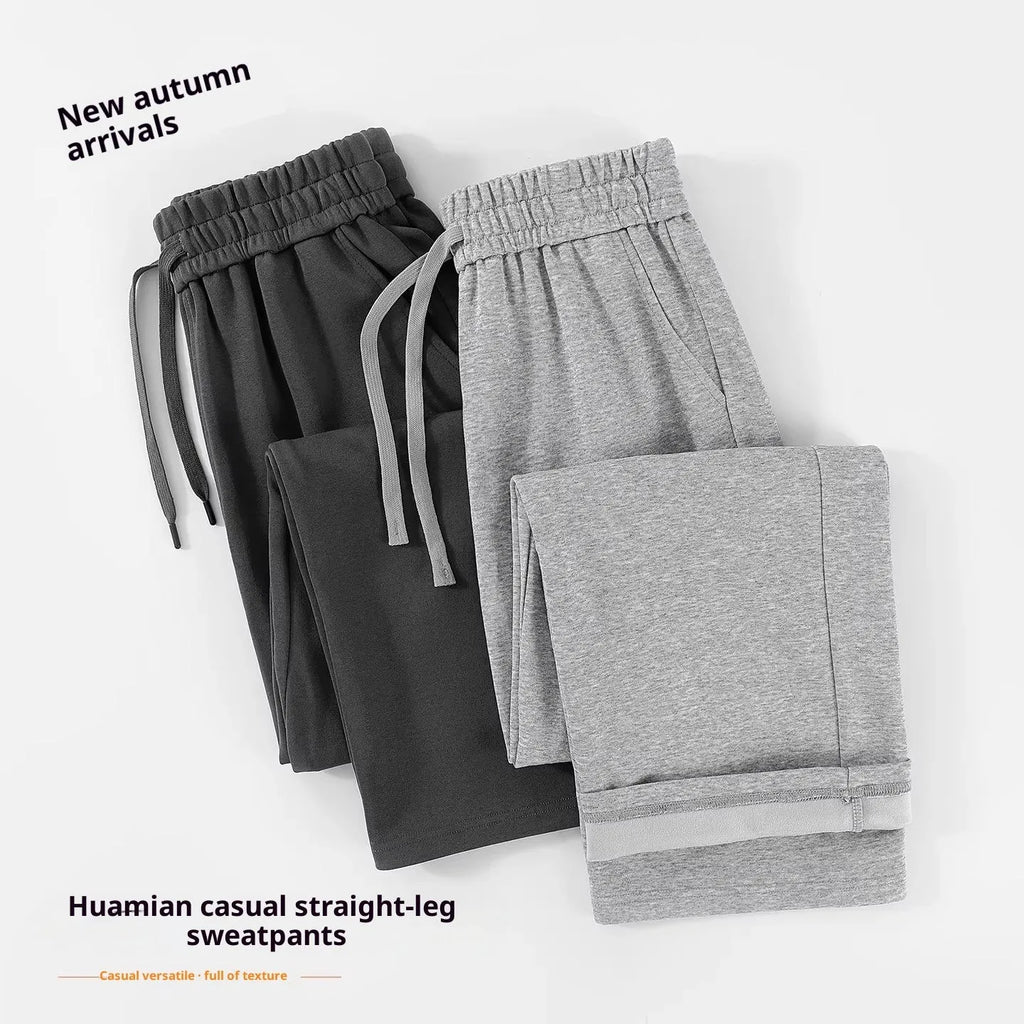High-waisted straight-leg cotton pants in heather gray, loose fit, available in multiple colours