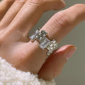 Silver open ring with cross zircon stones and geometric design