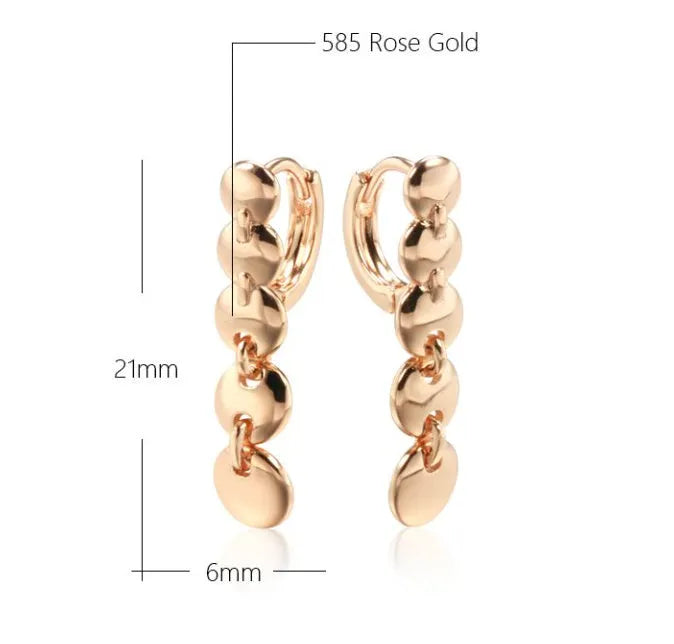 Gold-coloured retro circle earrings with 8cm diameter woven copper construction