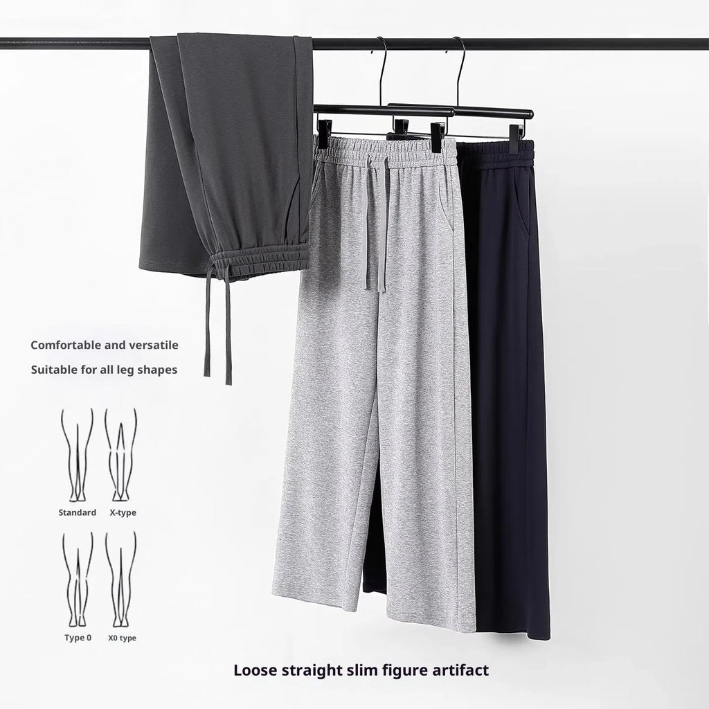 High-waisted straight-leg cotton pants in heather gray, loose fit, available in multiple colours