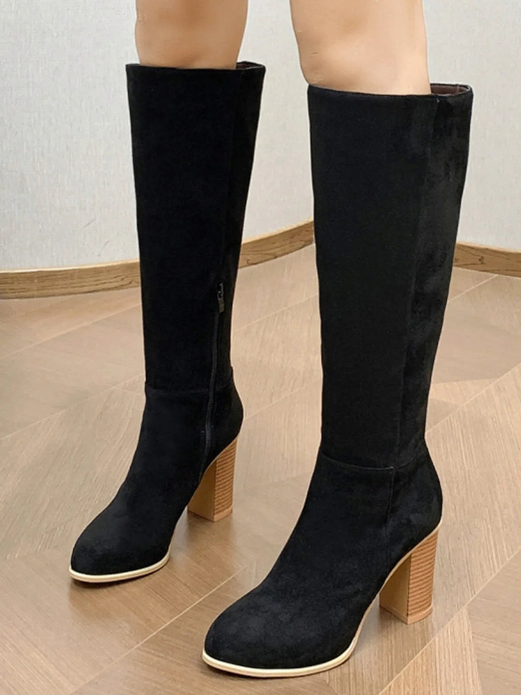 Women's black square toe high heel boots with artificial PU upper on wooden floor