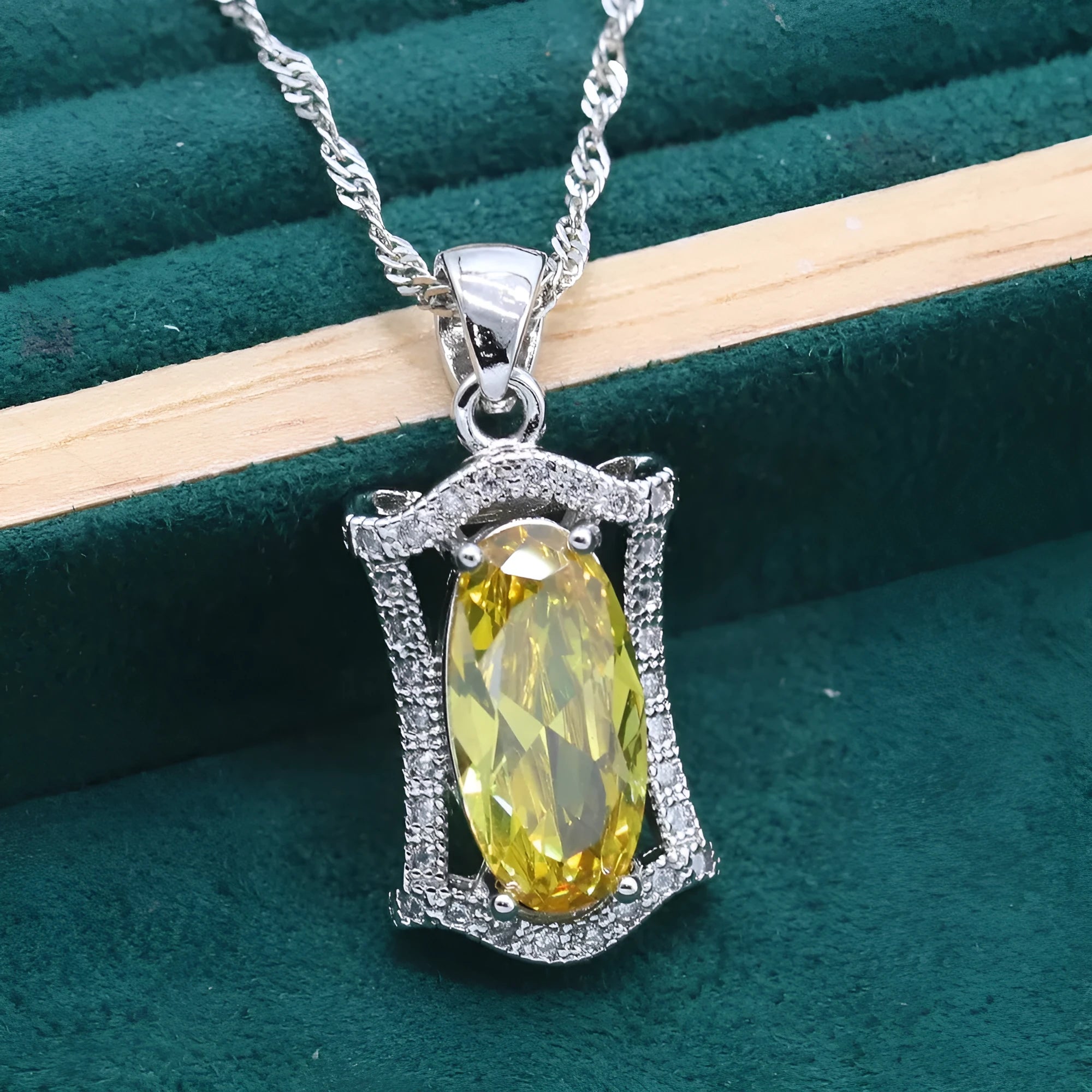 Anti-allergy zircon jewellery set with necklace, earrings, ring, and bracelet in yellow or olive colour.