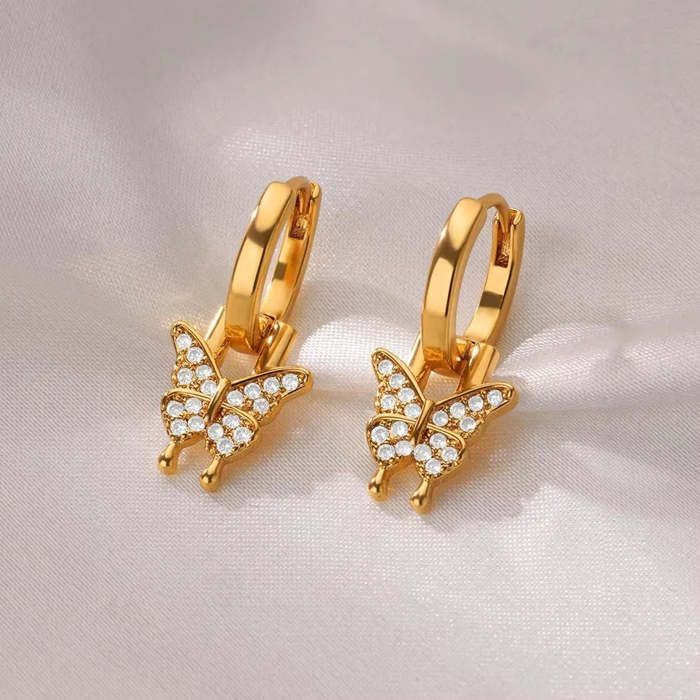 Women's geometric butterfly copper earrings with heart, bow, and star designs in multiple colour finishes