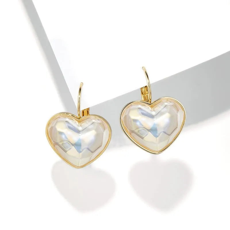 Gold colour alloy metal ear clips with summer love design theme for women's fashion