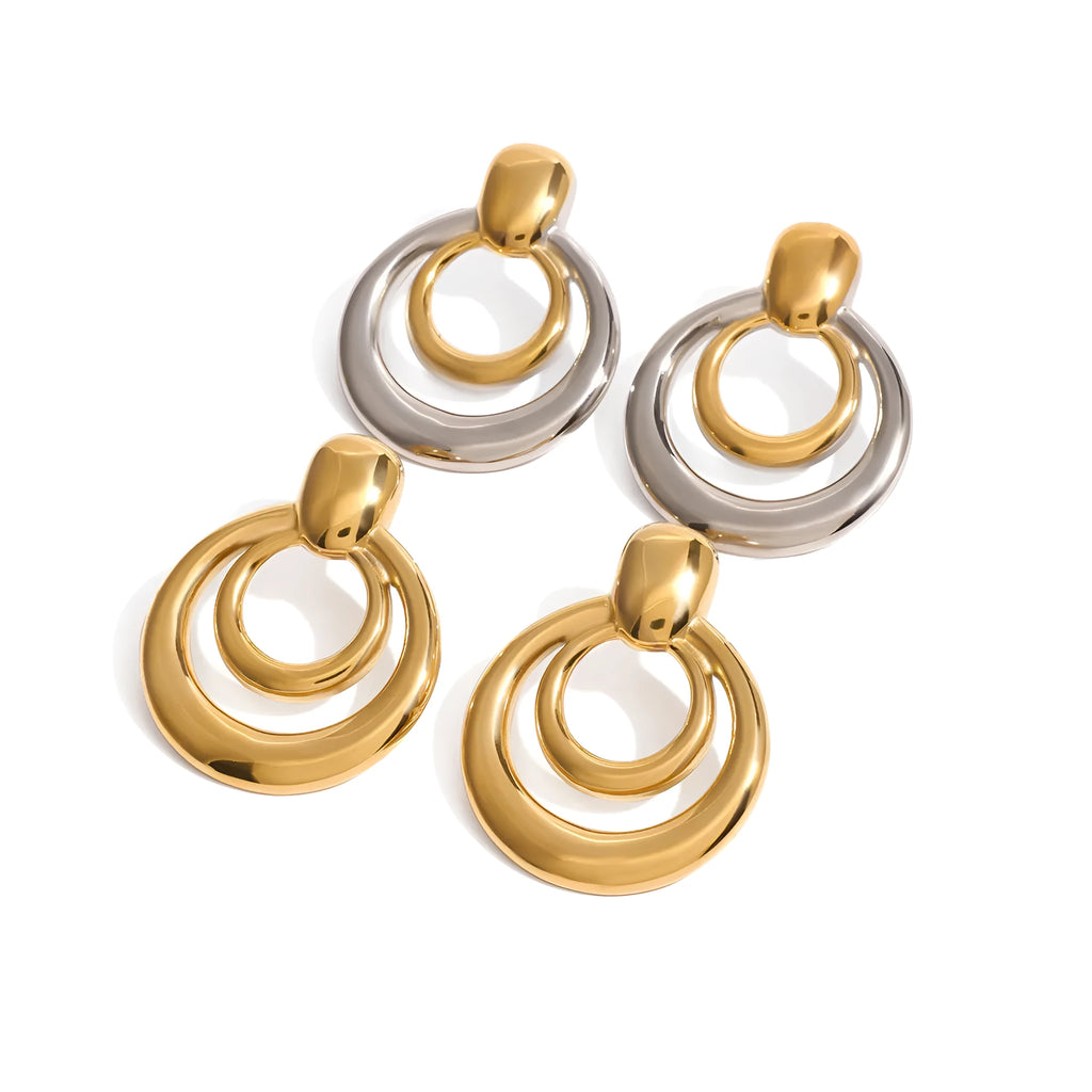 Gold tone geometric round stud earrings with hollow double-layer design on titanium steel backing