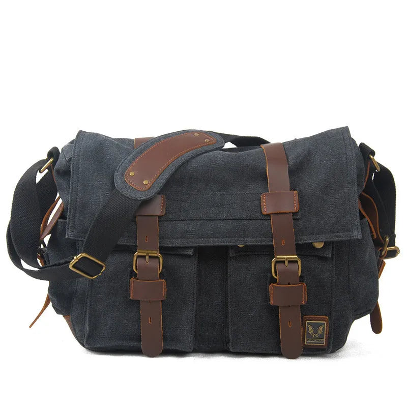 Men's army green canvas crossbody flap bag with leather trim shown open, revealing internal phone and document pockets.