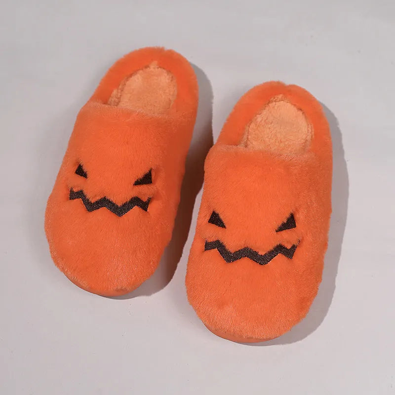 Orange Halloween pumpkin slippers with coral velvet upper and plush lining for indoor winter wear