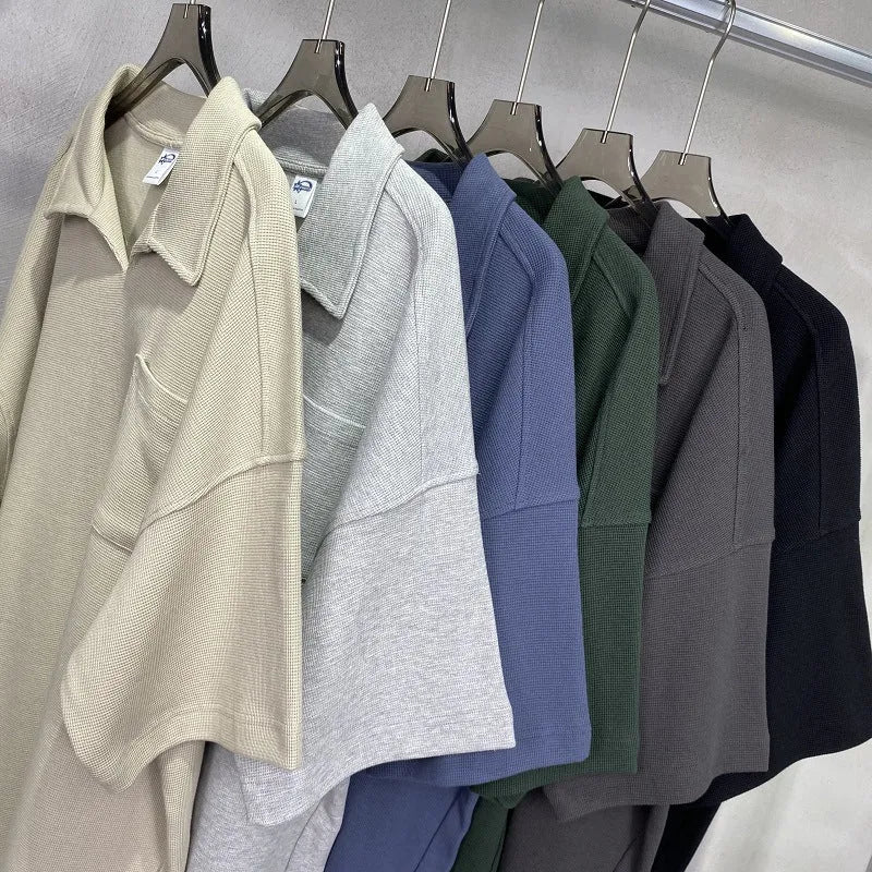 Cotton loose-fit drop-shoulder short sleeve top in Paris forest green, front view, with simple lapel neckline