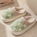 Women's plaid pattern plush slippers with a non-slip PVC sole, shown in a choice of colours.