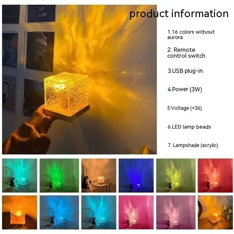 LED water ripple night light with 16 colours, USB cable, and remote control on a bedside table
