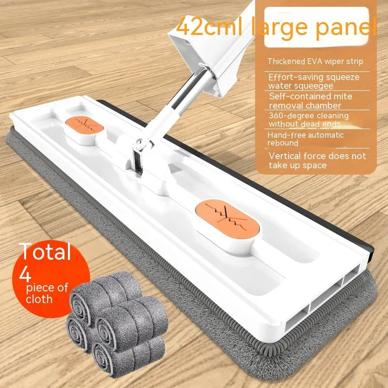 Large flat mop with stainless steel handle and blue mop cloth on hard floor