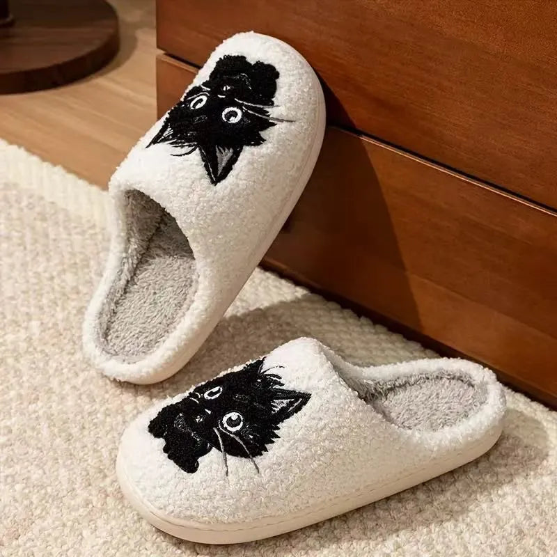 White cartoon Black Beard Cat couple slippers with plush fabric and a non-slip sole.