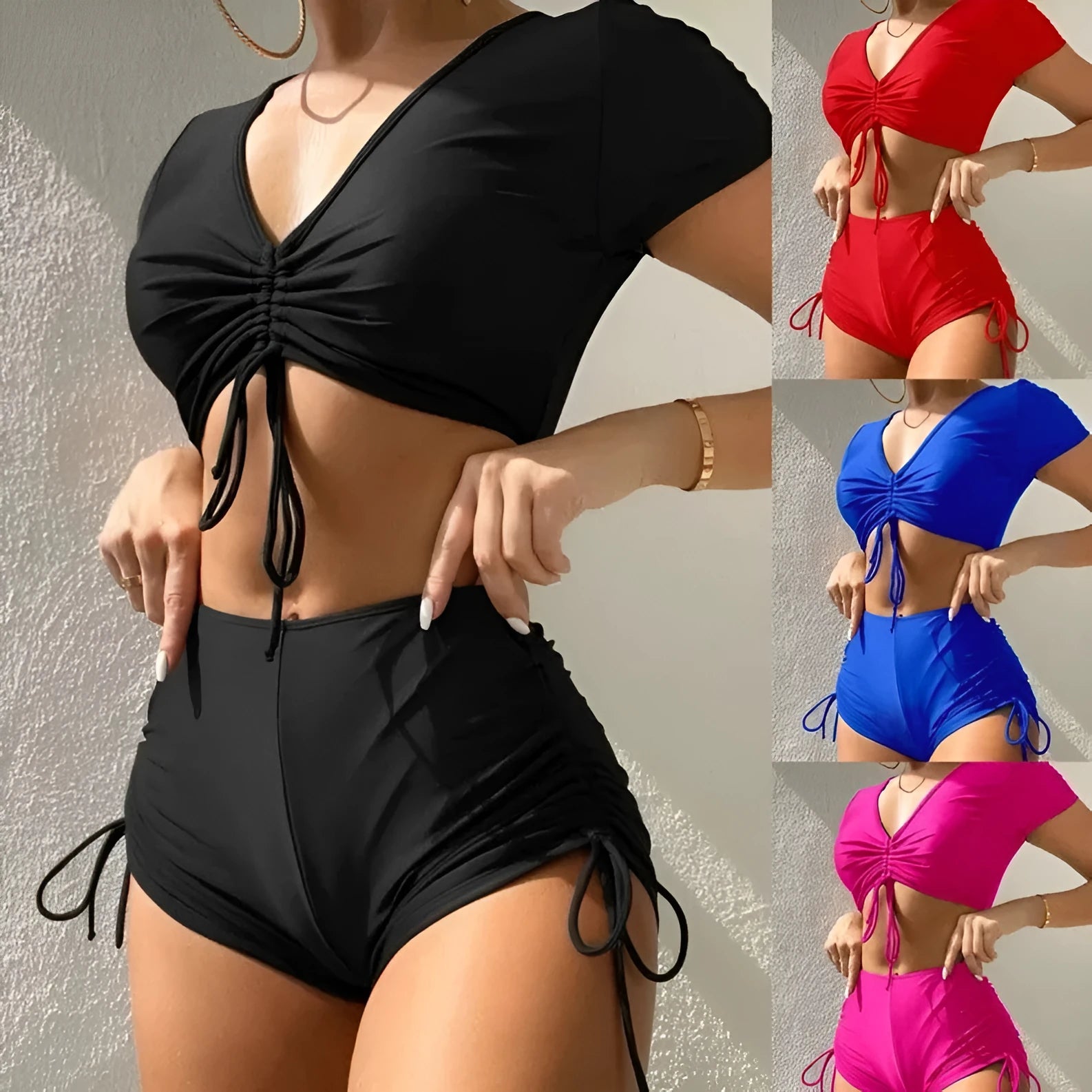 Women's dark green lace-up bow swimsuit top and shorts set for swimming.
