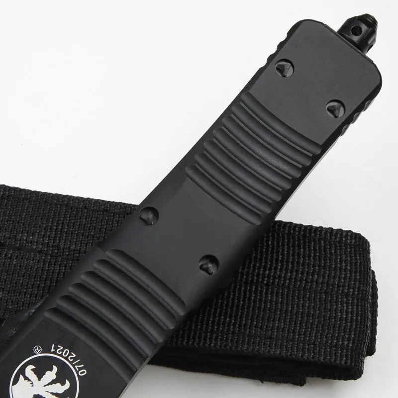 Outdoor camping tactical folding knife with D2 steel blade, black and white wire drawing finish, and aviation aluminium handle