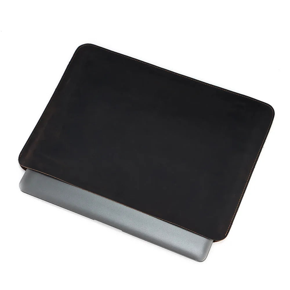 Brown genuine leather computer bag with horizontal liner design for organised storage