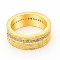 Gold geometric zircon ring in electroplated copper showing angular design details