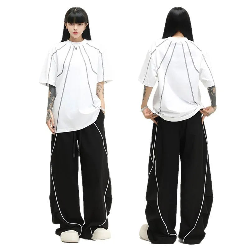 Black pleated wide-leg hip hop trousers with stripe pattern and mid waist cut