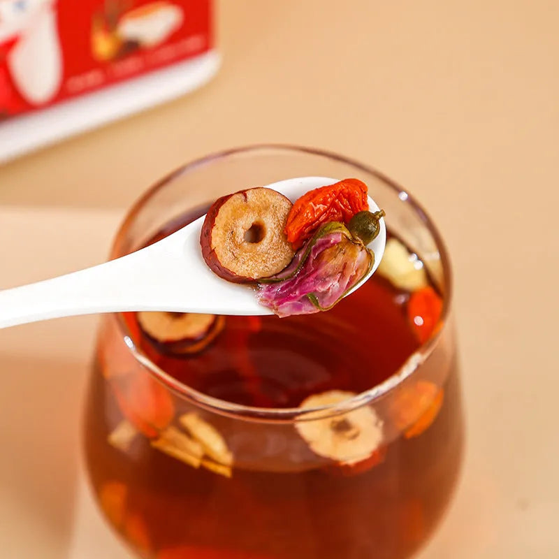 A 150g box of brown sugar ginger tea bags containing red dates, wolfberry, longan and rose