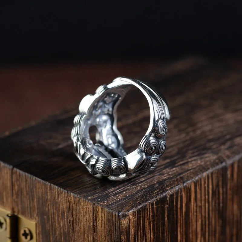 Silver open style ring with Jibeast animal zodiac pattern and diamond detailing