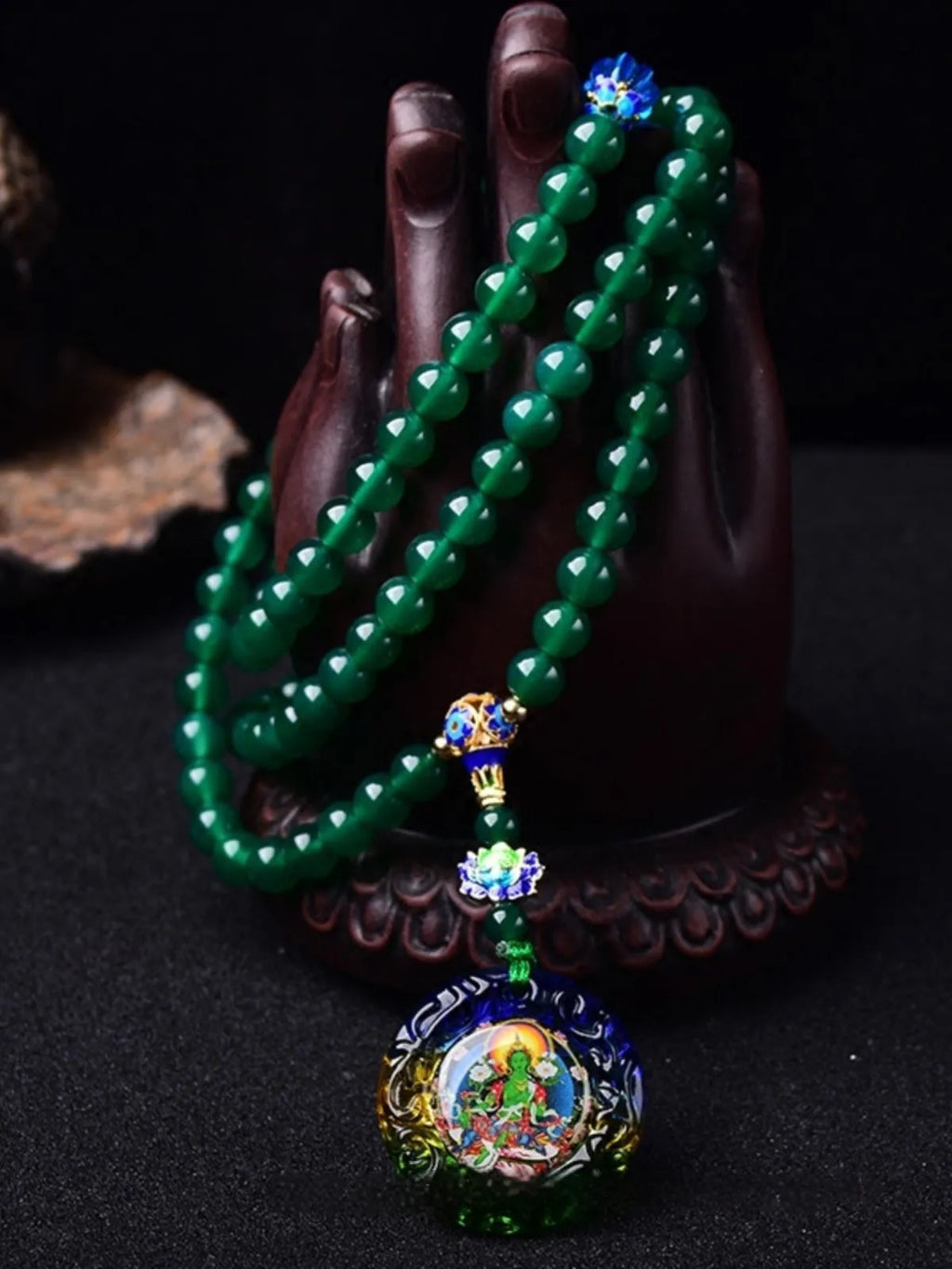 Handmade natural green agate Thangka pendant multi-circle bracelet on wrist.