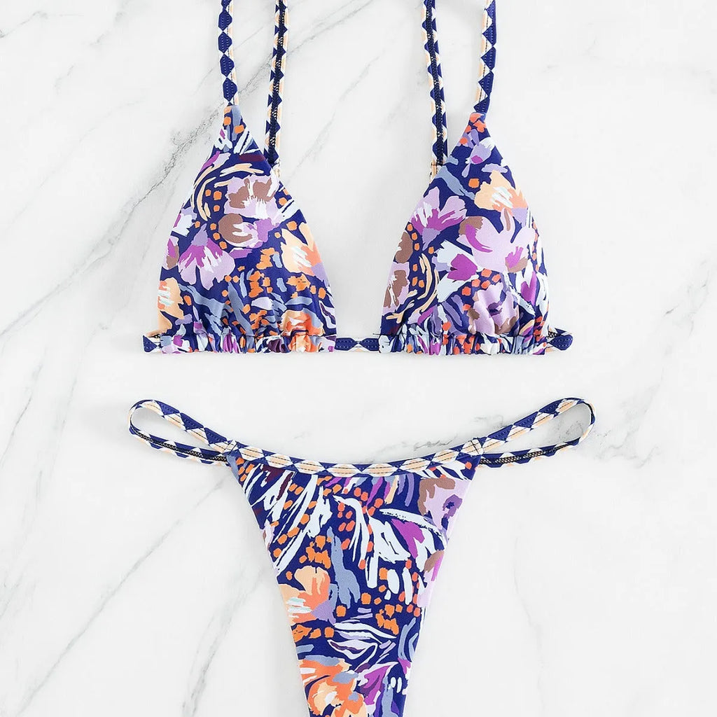Women's floral print polyester triangle bikini swimsuit with briefs-style bottom.