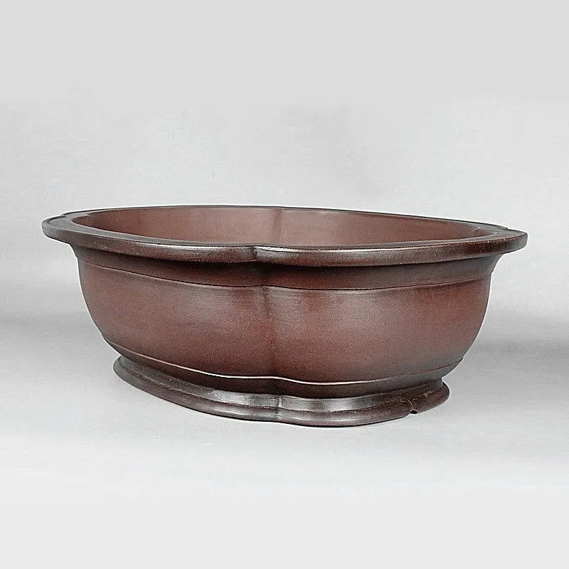 Handmade antique crabapple shaped purple clay flowerpot measuring 74x61x23cm
