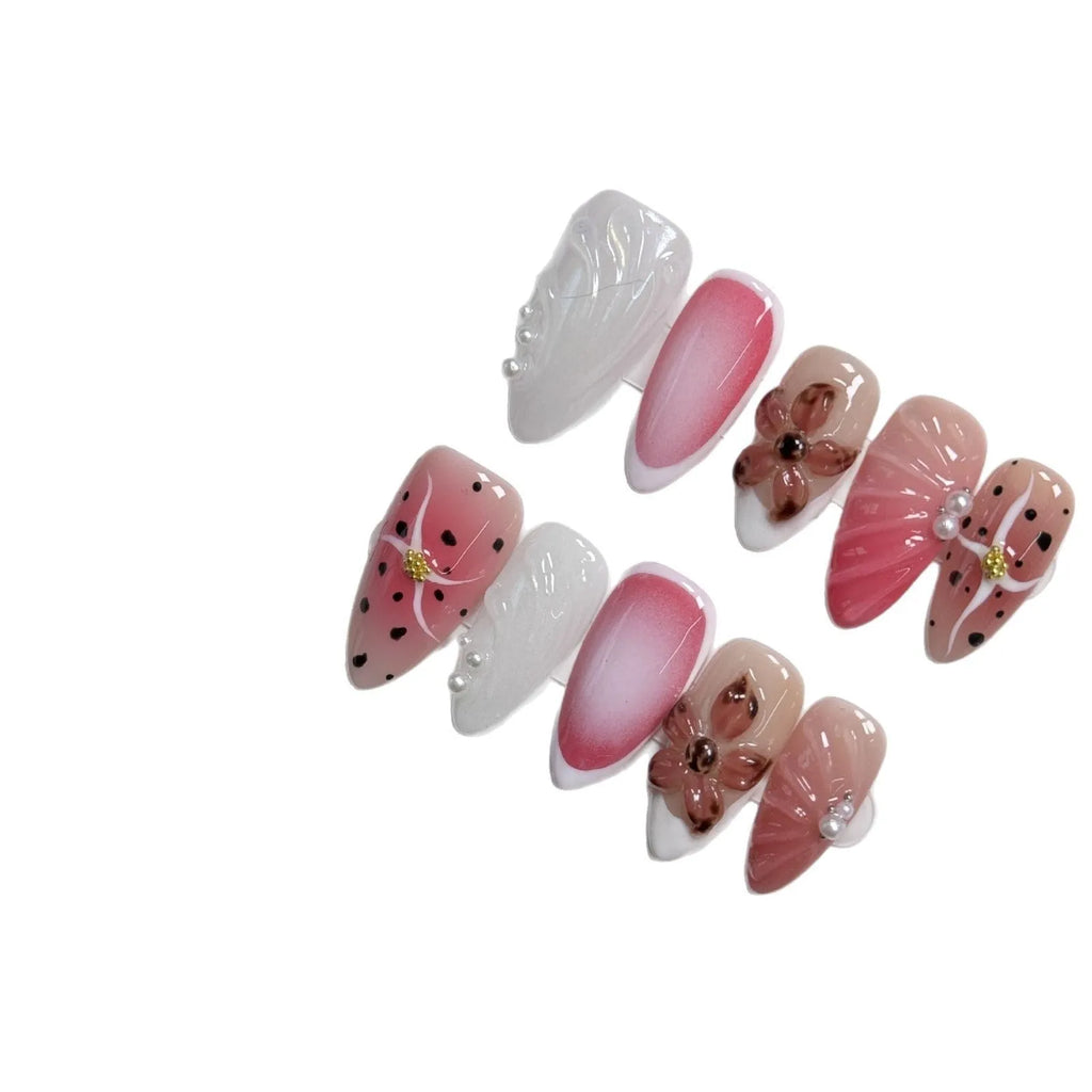 Hand-painted 3D carved nail beauty patches in candy and retro designs on almond-shaped plastic bases.