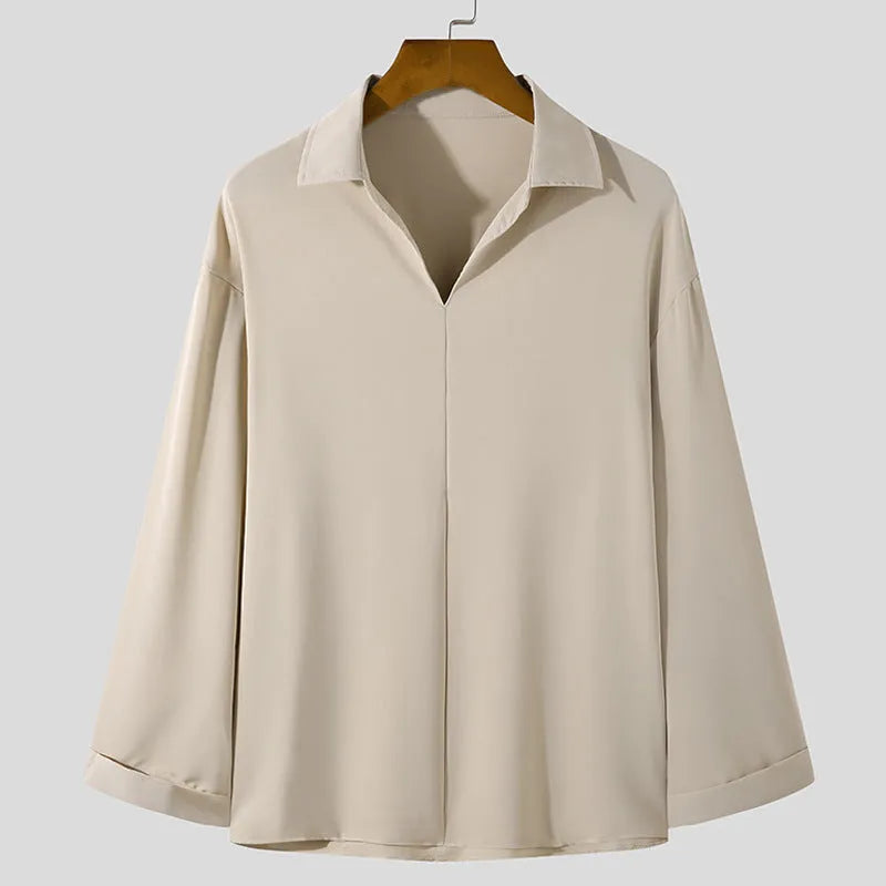 Loose lapels casual shirt in polyester fabric available in four colours with non-ironing feature