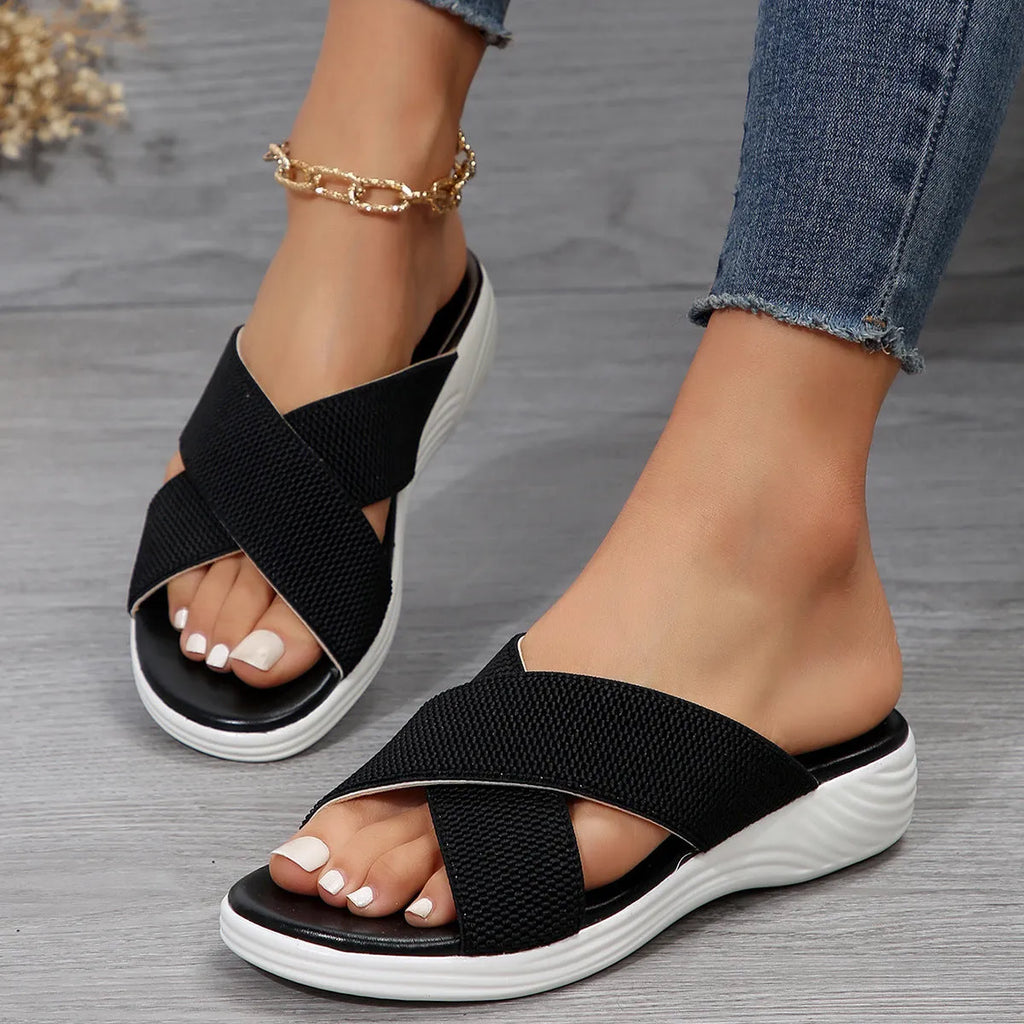 Women's black peep-toe wedge slippers with fish mouth design and thick rubber sole